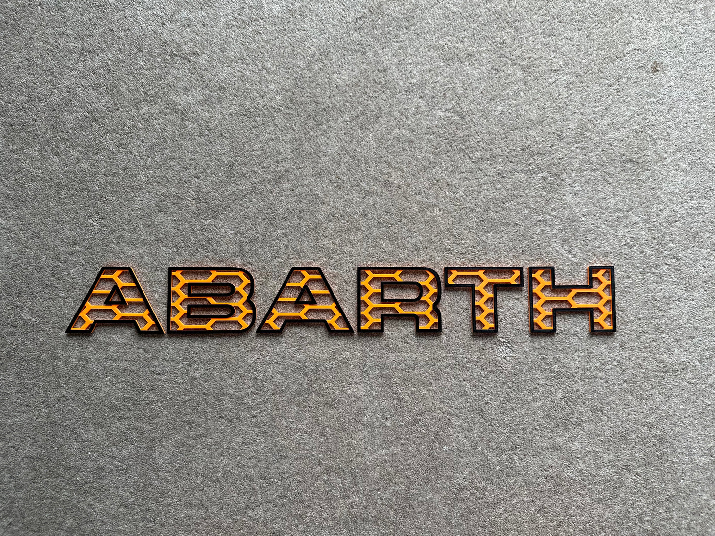 Patterned Abarth grille letters