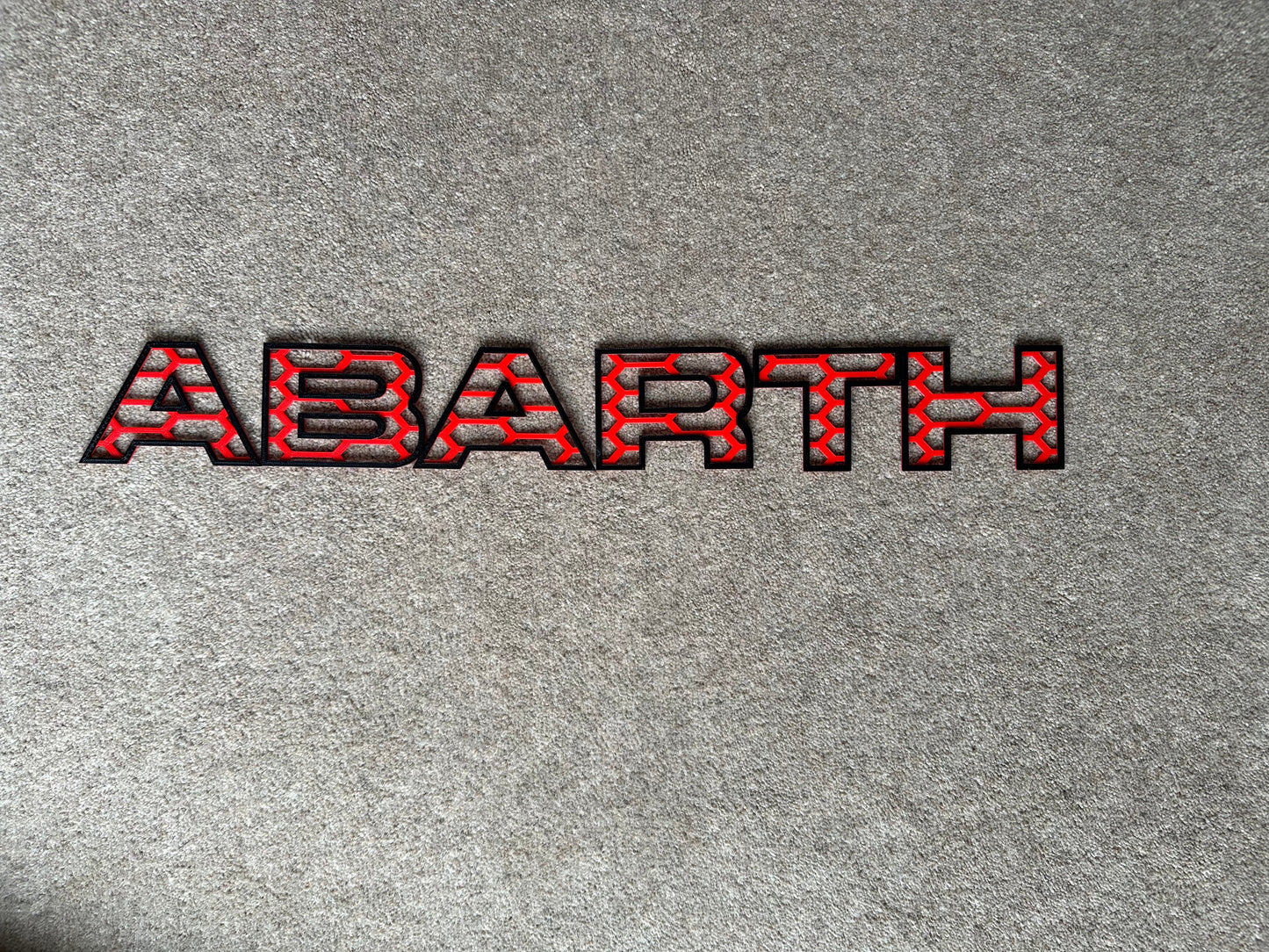 Patterned Abarth grille letters