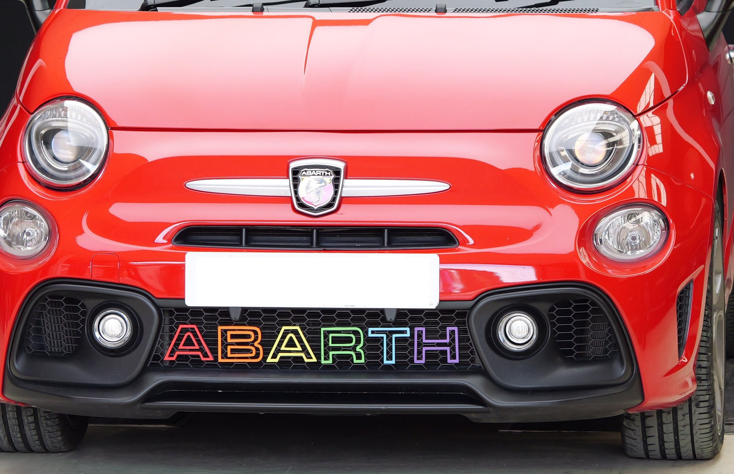 Custom coloured Abarth grille letters