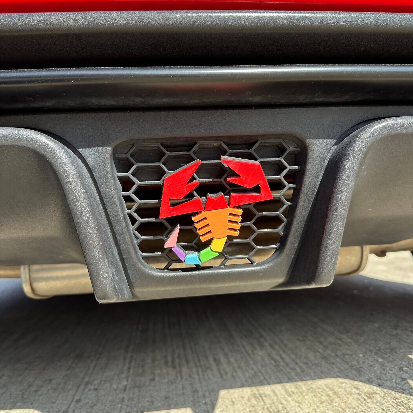 LGBTQ+ pride coloured Abarth scorpion