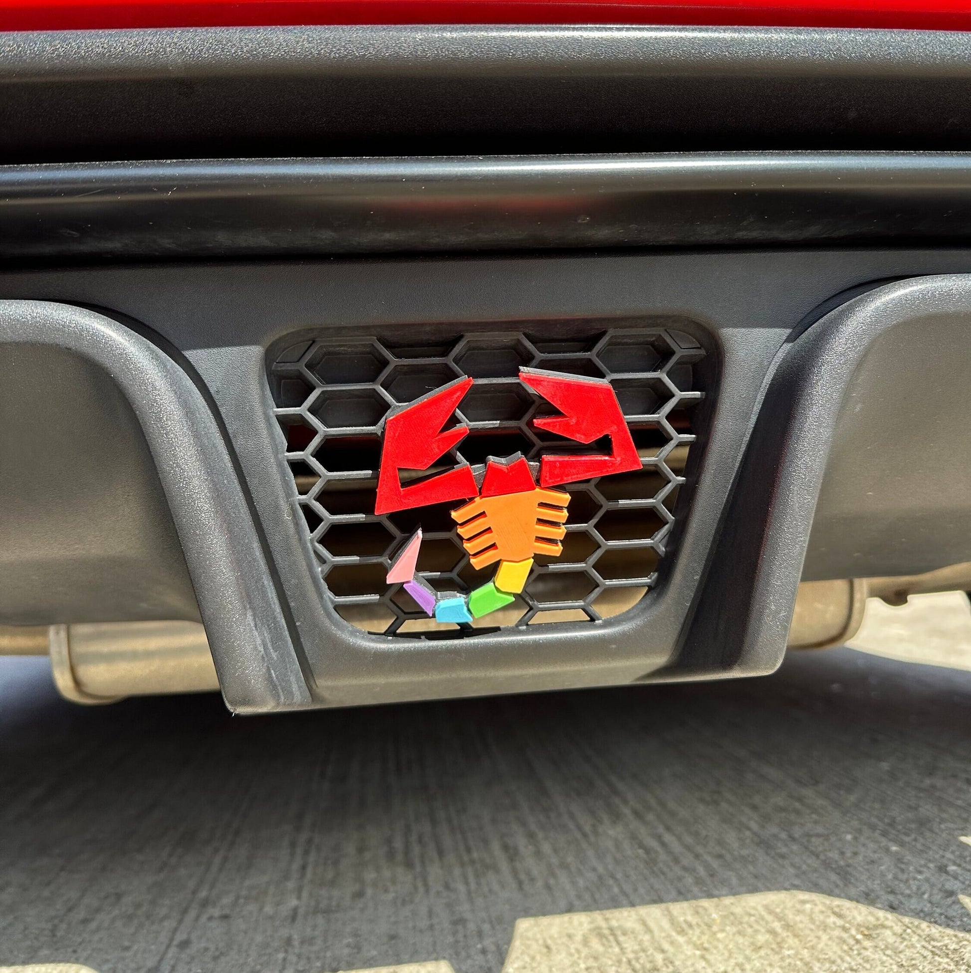 LGBTQ+ pride coloured Abarth scorpion