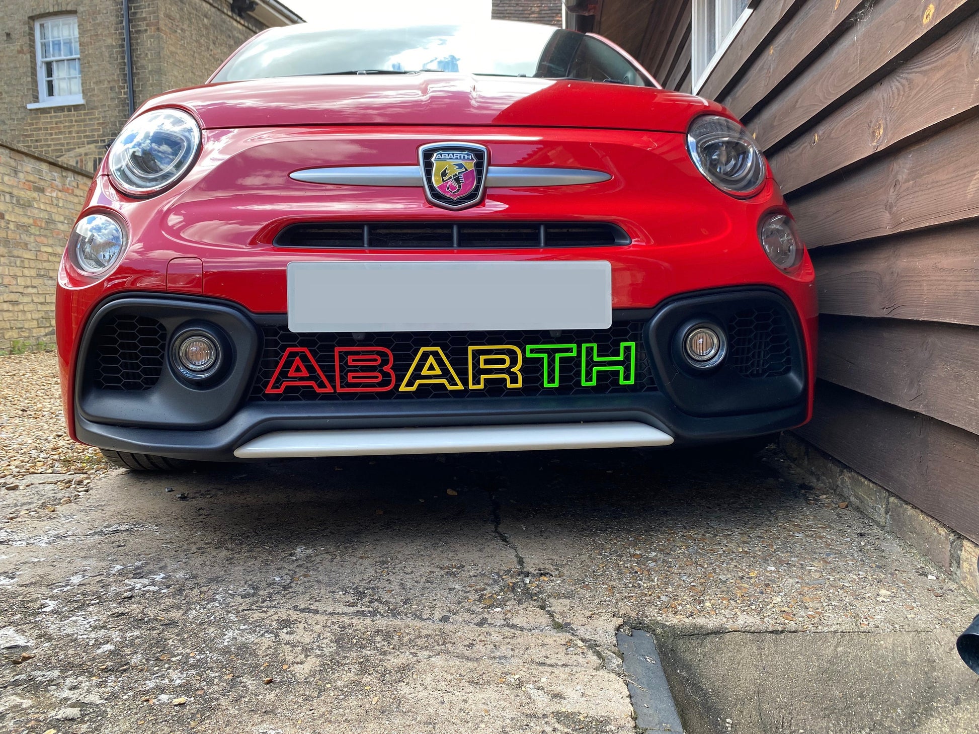 Custom coloured Abarth grille letters